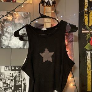Dark grey, star tank top from garage. Size medium.